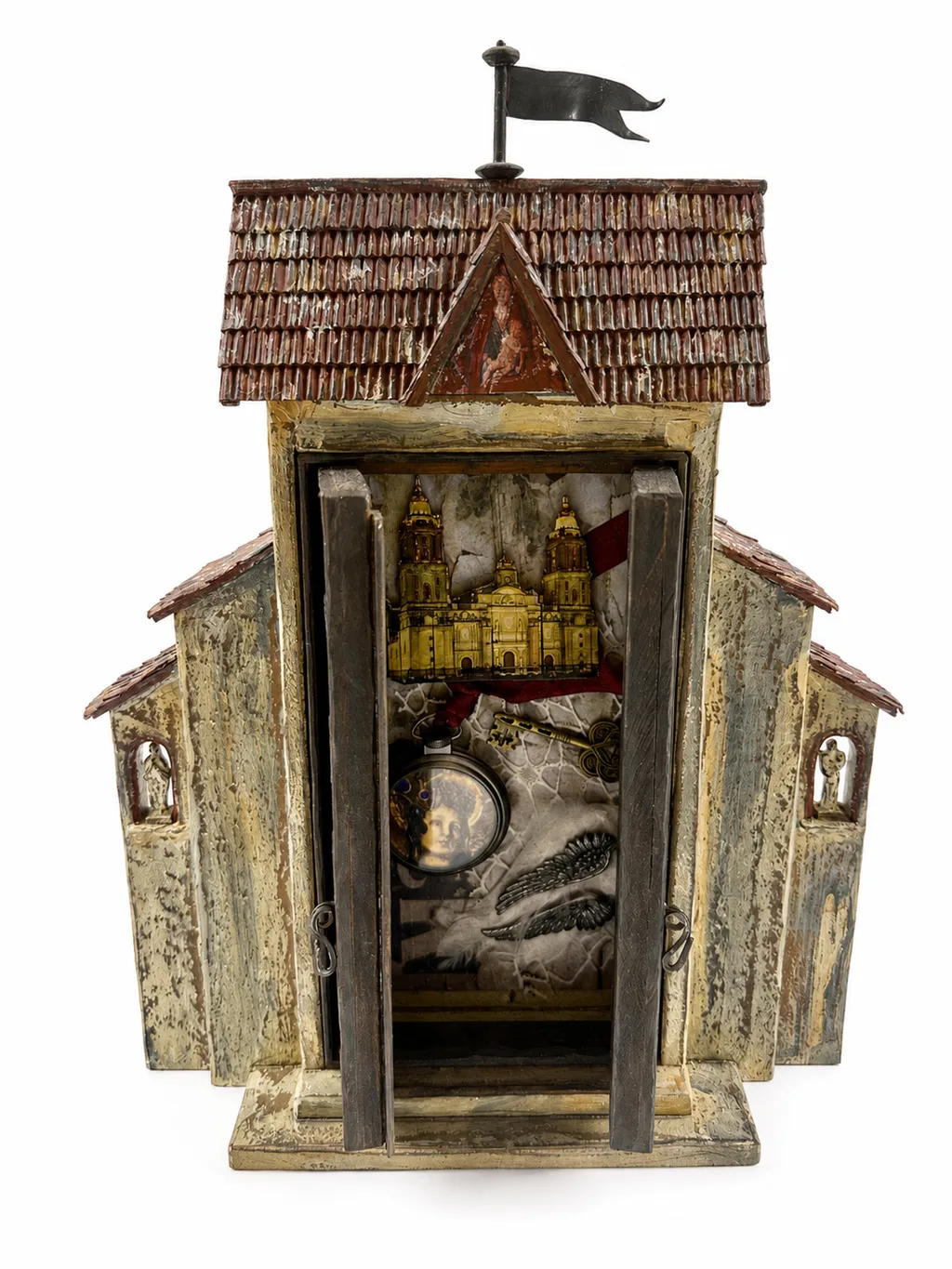 The Madonna Gate sculpture with its doors open, revealing PJ Cardinale’s interior collage after Memling’s Passion of Christ.