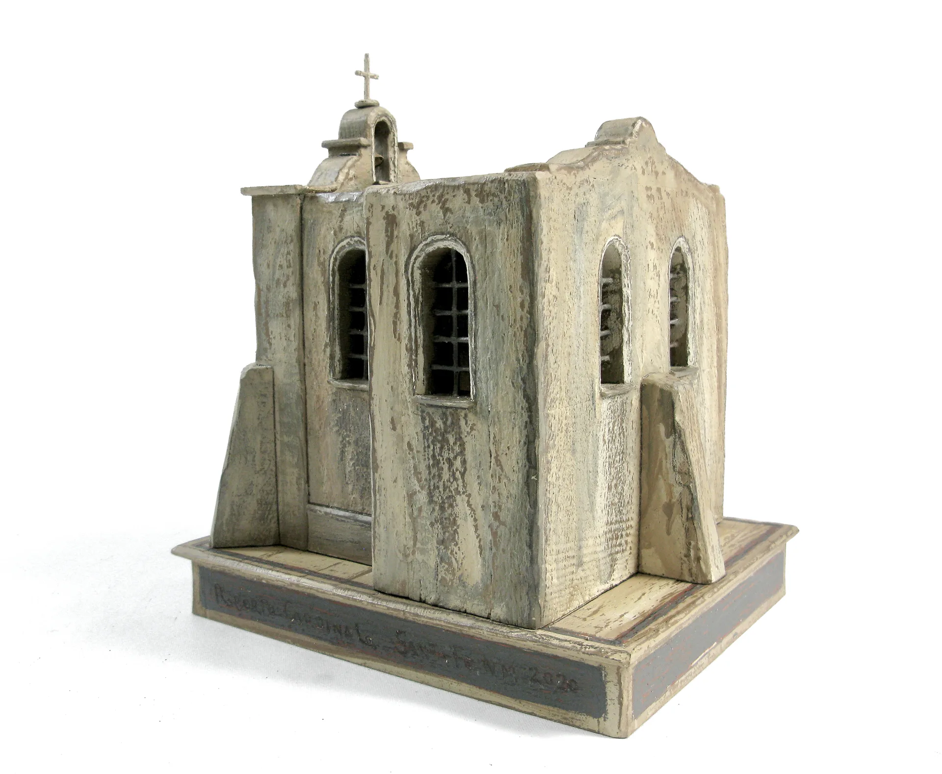 The Rosario Chapel sculpture from the rear, showing the nave roof and the buttressed side wall.
